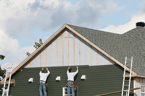 Professional Storm Damage Siding Repair technician working in Moncure, NC